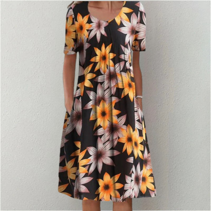 Helga | Elegáns, laza virágmintás ruha zsebekkel